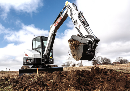 Bobcat compact excavator digging dirt