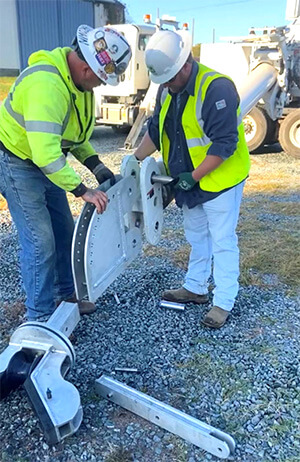 The Altec Batwing Portable Guard Structure attaches to Altec digger derricks or cranes and acts as a single-conductor guard. This T-6061 aluminum overhead safety mechanism ensures conductors stay off roadways and provides utility crews with a new, faster way to secure power lines when installing or maintaining them. 